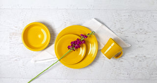 Daffodil place setting on a white wood tablescape