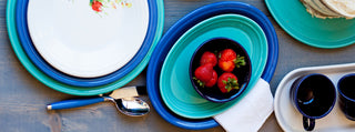 A mix of large and medium platters in cobalt and turquoise color