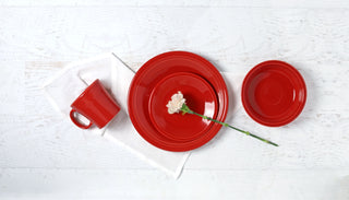 Scarlet place setting on a white wood tablescape