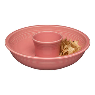 The Fiesta New Retired 2-Piece Chip and Dip Set in Peony, made in the USA from lead-safe china, features a central dip bowl with tortilla chips on the side, displayed against a white background.