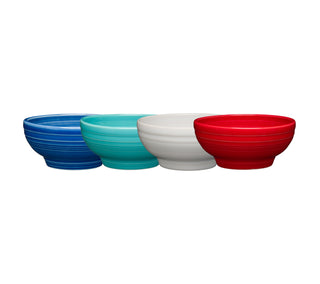 The Fiesta Factory Direct Mixed Small Footed Bowl Bundle features four ceramic bowls in blue, teal, white, and red with a ribbed texture and glossy finish, arranged in a row on a white background.