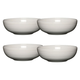 The Fiesta White Set of 4 Bistro Coupe 7 5/8-Inch 38OZ Medium Bowls features lead-free ceramic bowls with subtle ridges, arranged in two rows on a white background—ideal as a versatile 4-piece tableware set.