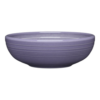 The Fiesta Lavender Bistro Coupe 7 5/8 Inch Medium Bowl (38 oz) features a round, shallow ceramic design in smooth matte lavender with subtle horizontal ridges, shown on a white background.