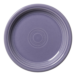 The Fiesta Bistro Coupe 6 1/4 Inch Appetizer Plate in Lavender is a round, glossy ceramic plate with concentric ridges, viewed from above on a white background—perfect for serving appetizers.
