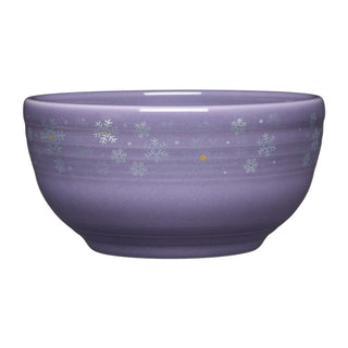The Fiesta Lavender Snowflakes Bistro Coupe 5 1/2 Inch Cereal Bowl 22 OZ features white and gold snowflake accents on purple—an ideal festive choice for your holiday breakfast table.