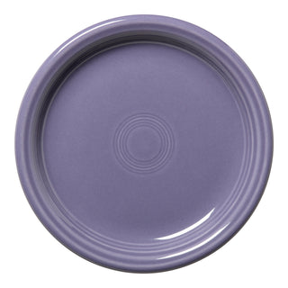 The Fiesta Lavender Bistro Coupe 7 1/4 Inch Salad Plate is a round, empty ceramic plate in solid lavender with subtle concentric circle patterns, viewed from above.