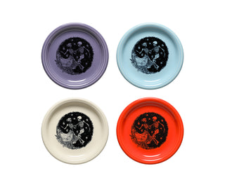 The Fiesta Skeleton Duet Mixed Colors Set of 4 Bistro Coupe 7 1/4-Inch Salad Plates features pastel purple, light blue, cream, and orange plates with black dancing skeletons and flowers—perfect for festive Halloween or Day of the Dead decor.