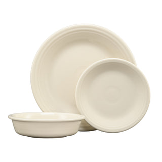 Three linen-colored ceramic dishes—the Fiesta Classic Rim 3-Piece Place Setting, Service for 1—feature subtle ridged edges and are arranged together on a white background. Made in the USA.