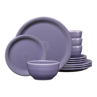 The Fiesta Lavender Bistro Coupe 12-Piece Dinnerware Set, Service for 4, features rich purple plates and bowls—perfect for creating a stunning, elegant table setting.