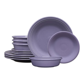 The Fiesta Lavender Classic Rim 12-Piece Dinnerware Set, Service for 4, includes dinner plates, salad plates, and bowls in lead-safe china, stacked and arranged against a white background.
