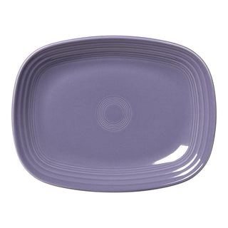 The Fiesta Lavender 12 Inch Large Rectangular Platter, made in USA, showcases a lavender ceramic surface with raised concentric circles and rim ridges, seen from above.