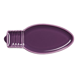 The Fiesta (FTC) Retired Light Bulb Plate in Mulberry is a lead-safe china serving platter with a glossy finish and detailed base. Made in the USA, this festive piece is perfect for entertaining.