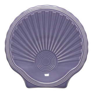 Fiesta’s Lavender Shell Shaped Plate (8 1/4") in purple ceramic features raised radiating lines and concentric circles—a graceful piece for any coastal-themed collection.