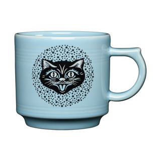 Introducing the Fiesta Black Cat Sky 16 OZ Stackable Mug—a light blue ceramic mug featuring a black illustration of a cat's head surrounded by small black stars, printed on one side. This stackable mug is dishwasher safe for easy cleaning.