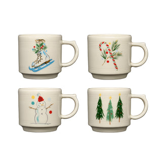 The Fiesta Jolly Christmas Set of 4 16oz Stackable Mugs features festive designs—reindeer on a sled, candy cane with holly, snowman with colorful buttons, and three decorated trees—perfect for holiday cheer.
