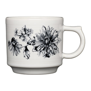 The Fiesta Botanical Floral Black 16oz Stackable Mug features a black botanical floral design with detailed flowers and leaves on white ceramic, part of Fiesta's elegant dinnerware collection, shown against a plain white background.