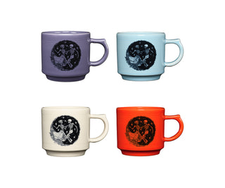 The Fiesta Skeleton Duet Mixed Colors Set includes four 16oz stacking mugs in purple, light blue, cream, and orange, each with black skeletons dancing—perfect for Halloween or Day of the Dead decor. Shown on a white background.