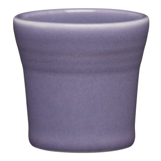 The Fiesta Lavender 1 1/2 OZ Ceramic Shot Glass is a small, round, purple vitrified china cup with slightly flared sides and a glossy finish, shown against a white background.