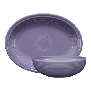 The Fiesta Lavender 2-Piece Serve Set includes an 11 5/8-inch oval platter with iconic concentric circles and a matching 38 oz bistro bowl, both in elegant ceramic.