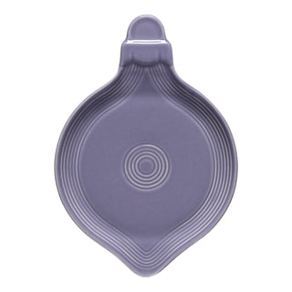 A Lavender 8 3/4 Inch Ornament Shaped Plate by Fiesta, featuring a rounded, ridged design and a small top handle, is shown from above against a white background—perfect for bringing a festive flair to your holiday table setting.