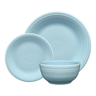 The Fiesta Classic Bistro 3-Piece Place Setting in Sky includes a dinner plate, salad plate, and cereal bowl, each featuring a simple design with subtle concentric circles, all arranged together against a white background.