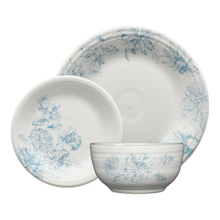 The Fiesta Botanical Floral Sky Classic Bistro 3-Piece Place Setting includes a dinner plate, salad plate, and bowl, each with delicate blue botanical patterns for an elegant table setting. Service for 1.