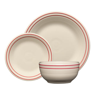 The Fiesta Americana Scarlet Band 3-Piece Place Setting, Service For 1, features a large plate, smaller plate, and bowl in cream with red rings, inspired by Fiesta's classic design and made in the USA.