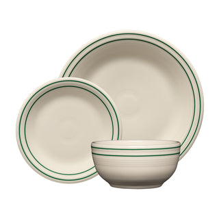 Three cream-colored dishes—the dinner plate, salad plate, and bowl—each featuring green stripes near the rim from the Fiesta Americana Jade Band Classic Bistro 3-Piece Place Setting, Service For 1, are arranged overlapping on a white background.
