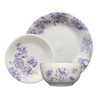 The Fiesta Botanical Floral Lavender Classic Bistro 3-Piece Place Setting includes a dinner plate, salad plate, and bowl featuring detailed purple floral patterns on white. Perfect for service for 1 and beautifully displayed against a white background.