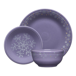 The Lavender Snowflakes Classic Bistro 3-Piece Dinnerware Set, Service For 1 by Fiesta Factory Direct includes a dinner plate, salad plate, and bowl featuring elegant white and gold snowflake patterns on a white background.