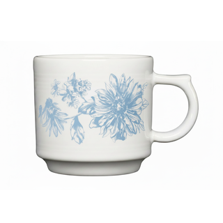 The Fiesta Botanical Floral Sky 16oz Stackable Mug features a white ceramic body with a large handle and delicate light blue floral designs on the side, making it a beautiful complement to any botanical floral dinnerware collection.