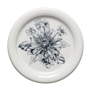 The Fiesta Botanical Floral Black 4 3/8 Inch Coaster and Mug Cover features a detailed black and white floral design with a large central flower, adding elegance to any table setting.