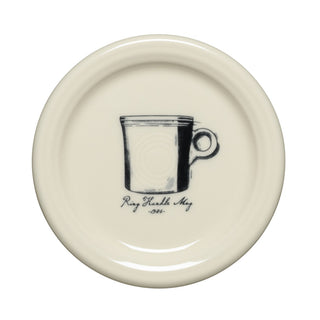 A cream-colored coaster from the Fiesta Icons Classic Ring Handle Mug and Sauceboat set, featuring a black line drawing of a cup in the center and cursive text below that reads “Ring Handle Mug 2006.”.