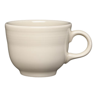 The Fiesta New Retired Classic 7 3/4 OZ Tea Cup in Linen features a plain cream color with a rounded handle, offering a lead-safe and timeless touch to your coffee or tea setting.