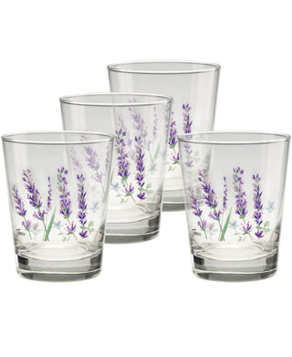 A set of four 15 oz. Fiesta Lavender Bloom tapered double old fashion tumblers by Moderne Glass, made in the USA, features purple lavender flower designs and is arranged in a staggered group on a white background.