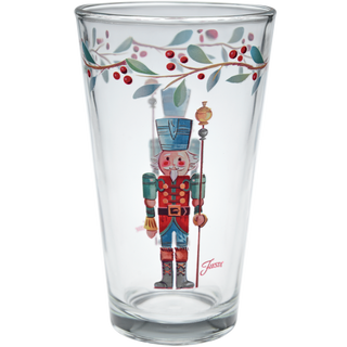 The Nutcracker The Guardian 16 oz. Cooler Glass set by Moderne Glass features festive nutcracker soldier art with red berry branches—ideal holiday tableware to add style to your Christmas dinnerware set. Set includes 4 clear glasses.