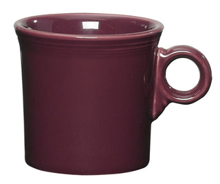 The Fiesta Retired Classic Ring Handle 10 1/4 OZ Mug in heather features a smooth, glossy ceramic finish, round handle, and slightly flared rim, displayed against a plain white background. Made in the USA.