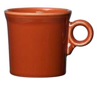 The Fiesta Retired Classic Ring Handle 10 1/4 OZ Mug in Paprika features a round handle and is made in the USA, shown against a white background.