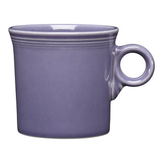 The Fiesta Lavender Classic Ring Handle 10 1/4 OZ Mug, crafted from lead-safe china with a round handle and subtle ridges near the rim, is shown on a white background.