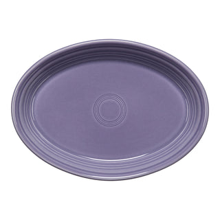 The Fiesta Lavender 9 5/8 Inch Small Oval Serving Platter is a lead-safe, purple ceramic plate with a smooth surface and concentric ridges, made in the USA.