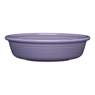 The Fiesta Lavender Classic Rim 6 7/8 Inch Cereal Bowl (19 OZ) features a round, shallow shape, subtle horizontal ridges, and a flared rim. Made from lead-safe china, it's microwave safe and comes in a solid lavender color.