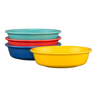The Fiesta Mixed Vibrant Classic Rim 6 7/8 Inch Cereal Bowl set includes four 19 oz bowls in turquoise, red, dark blue, and yellow, adding a cheerful, glossy touch to any colorful dinnerware collection.