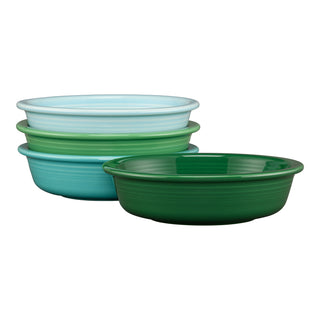 Four Fiesta Mixed Aegean Classic Rim 6 7/8" Cereal Bowls (19 oz) are stacked in shades of green and blue, with the darkest at the bottom and the lightest aqua on top. The set of four features a smooth, slightly flared rim.
