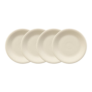 The Fiesta (FTC) Linen Set of 4 Classic Rim 7 1/4 Inch Salad Plates, featuring subtle ridged edges, brings timeless style to any table setting. Four round plates are displayed in an overlapping row on a white background.