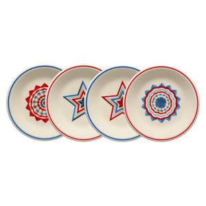 The Fiesta (FTC) Americana Set of 4 Classic Rim 7 1/4 Inch Salad Plates features cream-colored plates decorated with red, white, and blue stars and geometric patterns, adding classic Americana charm to your table.
