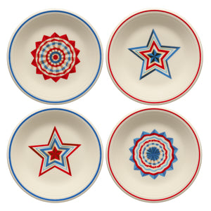 The Fiesta (FTC) Americana Set of 4 Classic Rim 7¼" Salad Plates features unique red, white, and blue star or geometric patterns on cream ceramic. Proudly made in the USA, these plates add patriotic flair to your table.