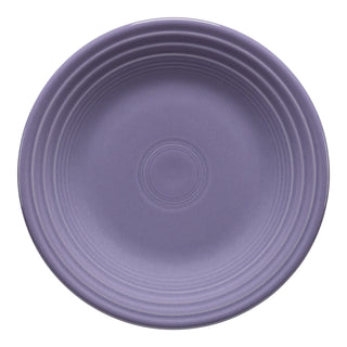 A round Lavender Classic Rim 9 Inch Luncheon Plate by Fiesta, featuring a matte finish and concentric raised rings, is shown from above on a white background. Proudly made in the USA.