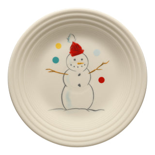 The Fiesta (FTC) Jolly Christmas Snowman Classic Rim 9 Inch Luncheon Plate features a smiling snowman with a red hat, carrot nose, stick arms, colorful dots, a ridged edge, and is dishwasher safe for easy holiday cleanup.