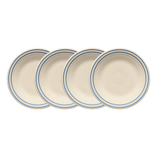 Four Fiesta Americana Lapis Band Classic Rim 9 Inch Luncheon Plates, set of 4, are arranged overlapping in a row. Each cream-colored plate features two thin blue rings near the rim. The background is white.