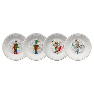 Fiesta Nutcracker Set of 4 Classic Rim 9 Inch Luncheon Plates, each featuring festive embossed designs—a pair of nutcrackers, a girl in red and green, and a ballerina—perfect for your holiday table.